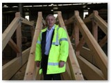 01 Vincent Fay of GEM Purcell beside completed roof trusses in GEM Joinery