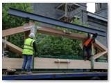 14 A metal harness was designed to make the lifting and manoeuvring of the trusses easier