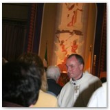 26 Fr Tom greets parishioners at the end of the Mass for his 25th anniversary of ordination