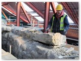 02 An old coping stone at the top of the east wall has been prised loose and lifted on to a roller