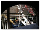02 The work seen through the half-moon window opening from the nave of the Cathedral