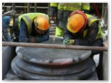 03 Making sure its position is exact using the plumb line that drops from roof level above