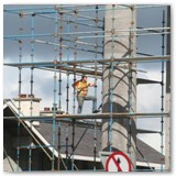 03 Scaffold worker with presbytery roof in the background