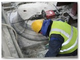 04 A kango hammer is used to remove the base of an old pillar