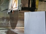 04 The large blocks are next brought to the processing plant where they are shaped by a circular diamond cutting blade