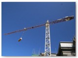 04 Wooden beams are lifted into the Cathedral to construct the roof around the trusses