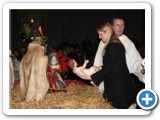 05 Midnight Mass 2010 Baby Jesus Placed in Crib