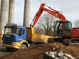 08 The earth is removed from the Cathedral site by truck