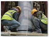 08 The pillar is moved gently into  position using small pieces of wood