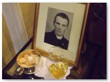 09 Gifts table with a portrait of the young Fr Martin