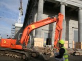 09 Work done - tower crane in the background - wooden frames protecting the bottom of the pillars and steps visible too