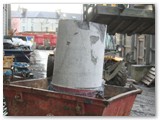 11 The crane had transferred this section of old column into a skip
