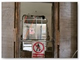 11 The entrance door to the choir gallery stairs with the wall now broke through to the east side porch