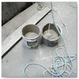 12 Buckets of plaster ready to be hauled up to the ceiling