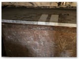 21 Two different cleaning methods used in sample areas clearly stand out on the top panel of the Holy Family altar