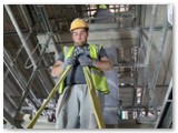 23 Getting the straps ready for attaching to the electric hoist