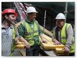 24 Carpenters Vinnie Walker, Edgeworthstown and Noel Farrell, Colmcille along with site foreman Bob Neilan, Granard