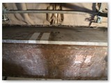 24 Note the cloth doors in the background which protect the Holy Family painting which survived the fire largely intact