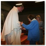 25 Angela Greer and Mary Kenny  bring up the bread and wine in the Offertory Procession