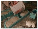 26 Pouring the plaster into moulds
