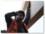 28 The operation is co-ordinated by the banksman who is in constant contact by phone with the crane driver