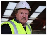 32 The site foreman for GEM Purcell taken high up underneath the temporary roof