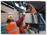 36 The truss is now connected by chain to an electric hoist