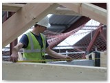 43 Making sure one truss is the right distance from its neighbour