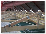 51 The roof walkway coming through the trusses