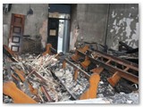 TD13 Seats half-burnt in Holy Family Chapel