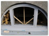35 One of the frames in place with the glass sections to be inserted next